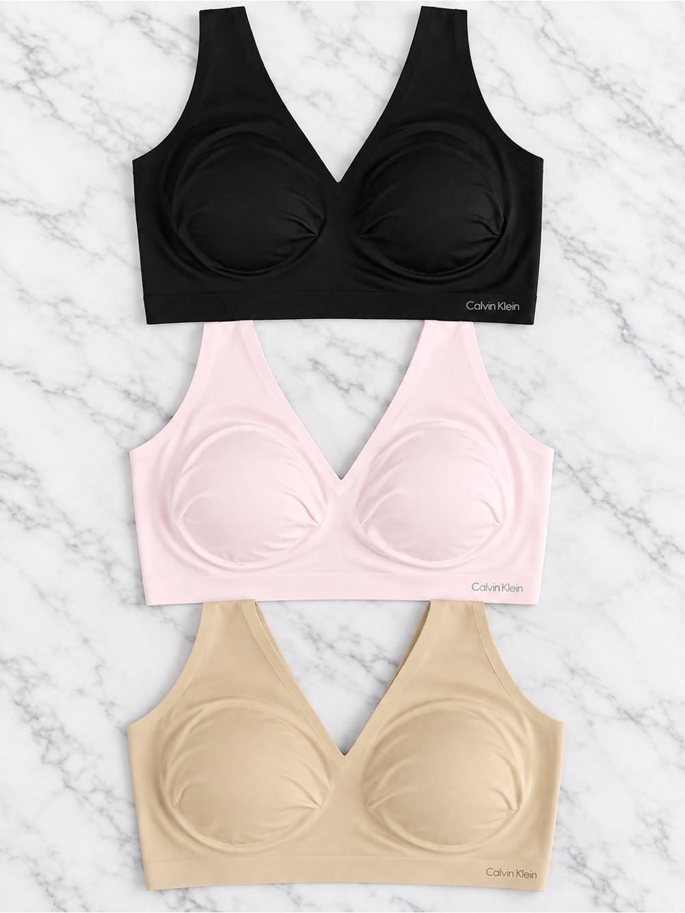 Bundle (3) Calvin Klein Seamless V-Neck Bralettes - Black, Light Pink, Nude